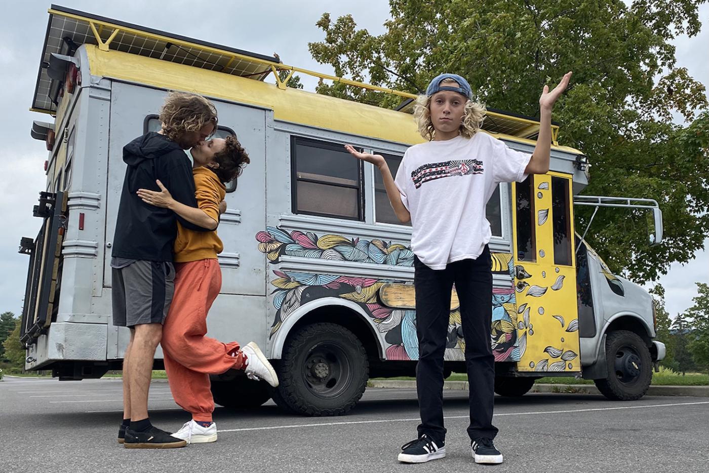 The blogger with her partner, son, and their school bus home.