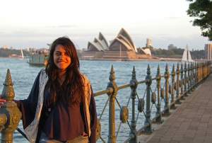 Roops stands in front of Sydney&#039;s iconic Opera House.