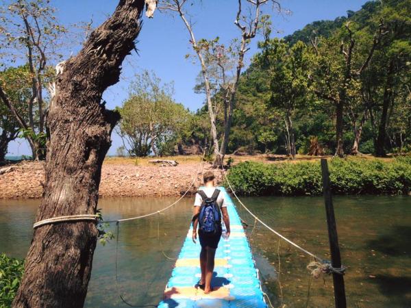 Lex crosses a bridge on Koh Tarutao.